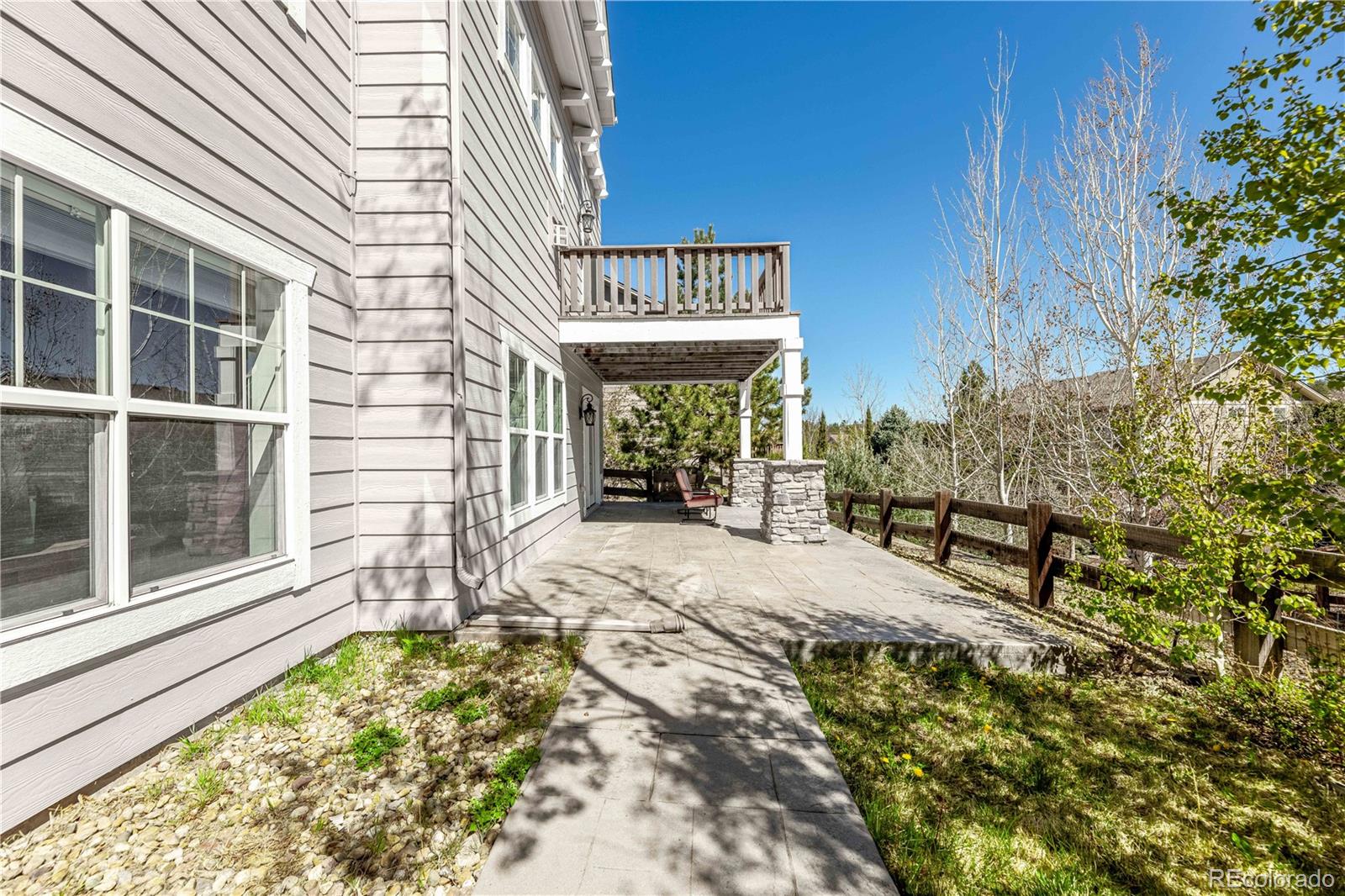 1610 Ridgetrail Court Castle Rock, CO 80104 - Photo 41 of 50 a house with garden in front of it