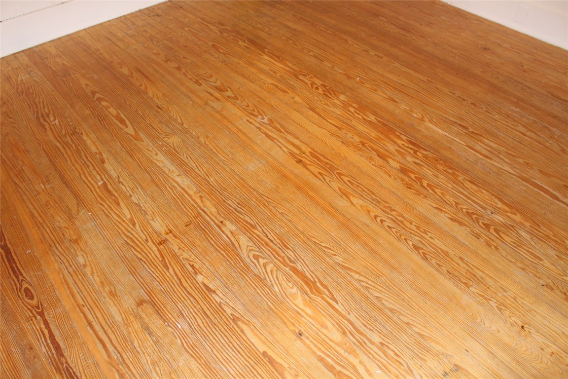 2826 Salado Street Austin, TX 78705 - Photo 16 of 29 a view of empty room with wooden floor