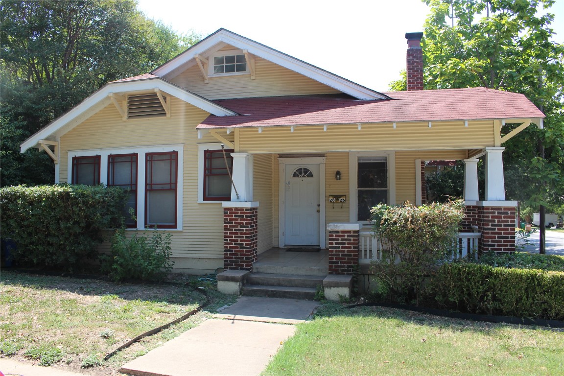 2826 Salado Street Austin, TX 78705 - Photo 2 of 29 a front view of a house with garden