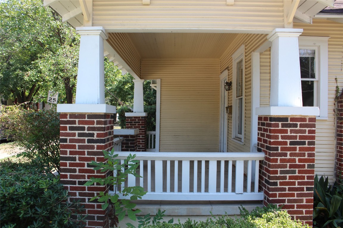 2826 Salado Street Austin, TX 78705 - Photo 3 of 29 a view of a chair and table in the balcony