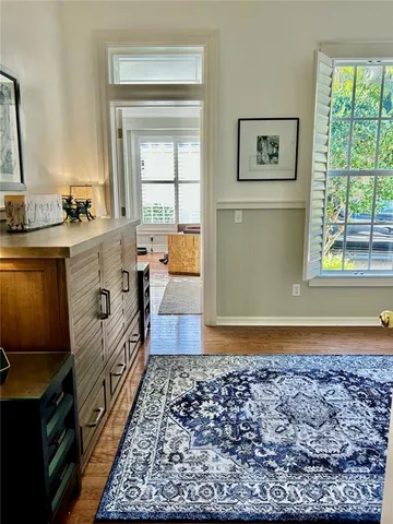 a kitchen with granite countertop a sink and a stove top oven
