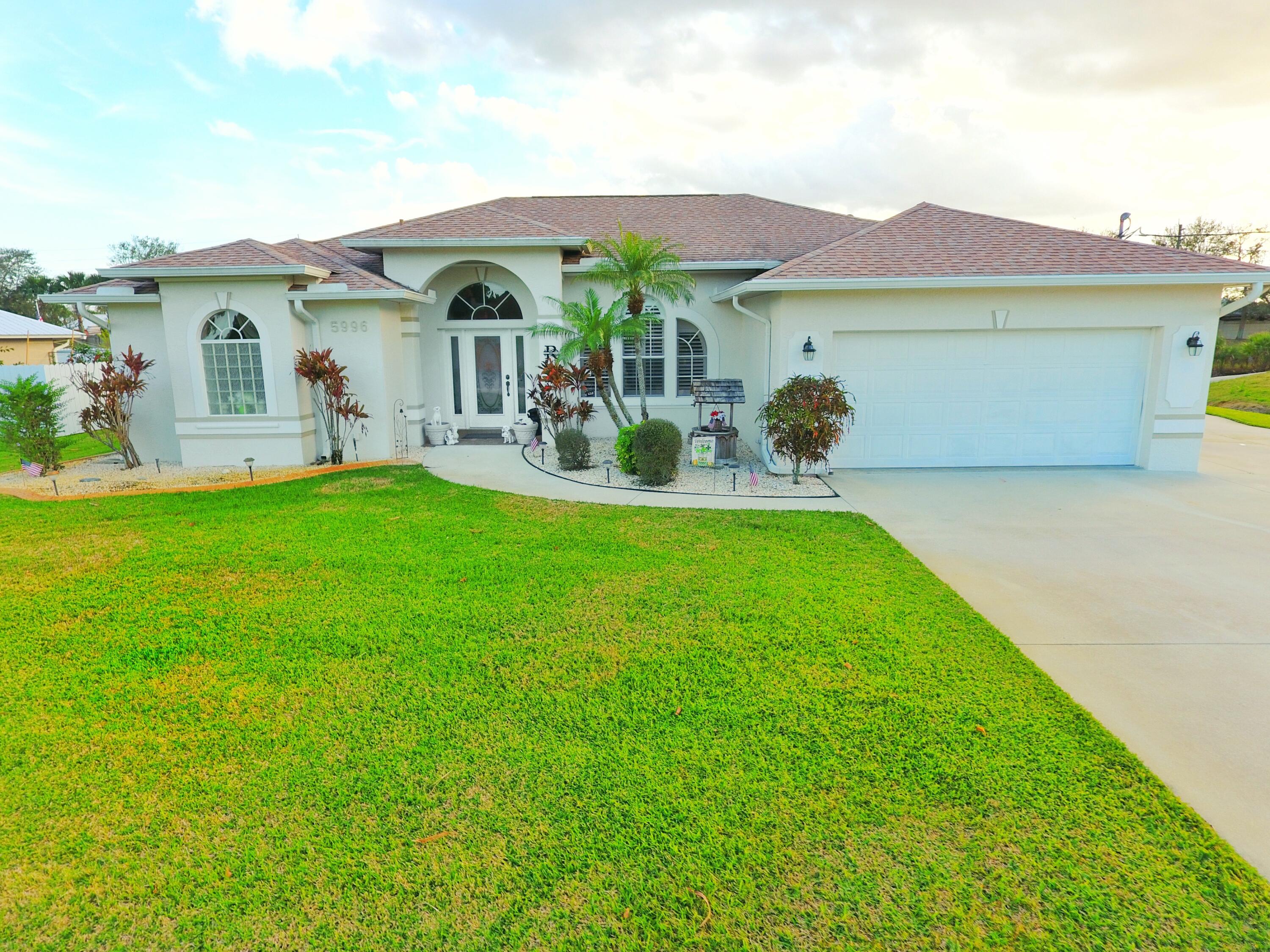 5996 Northwest Wolverine Road Port St. Lucie, FL 34986 - Photo 1 of 27 Front Exterior