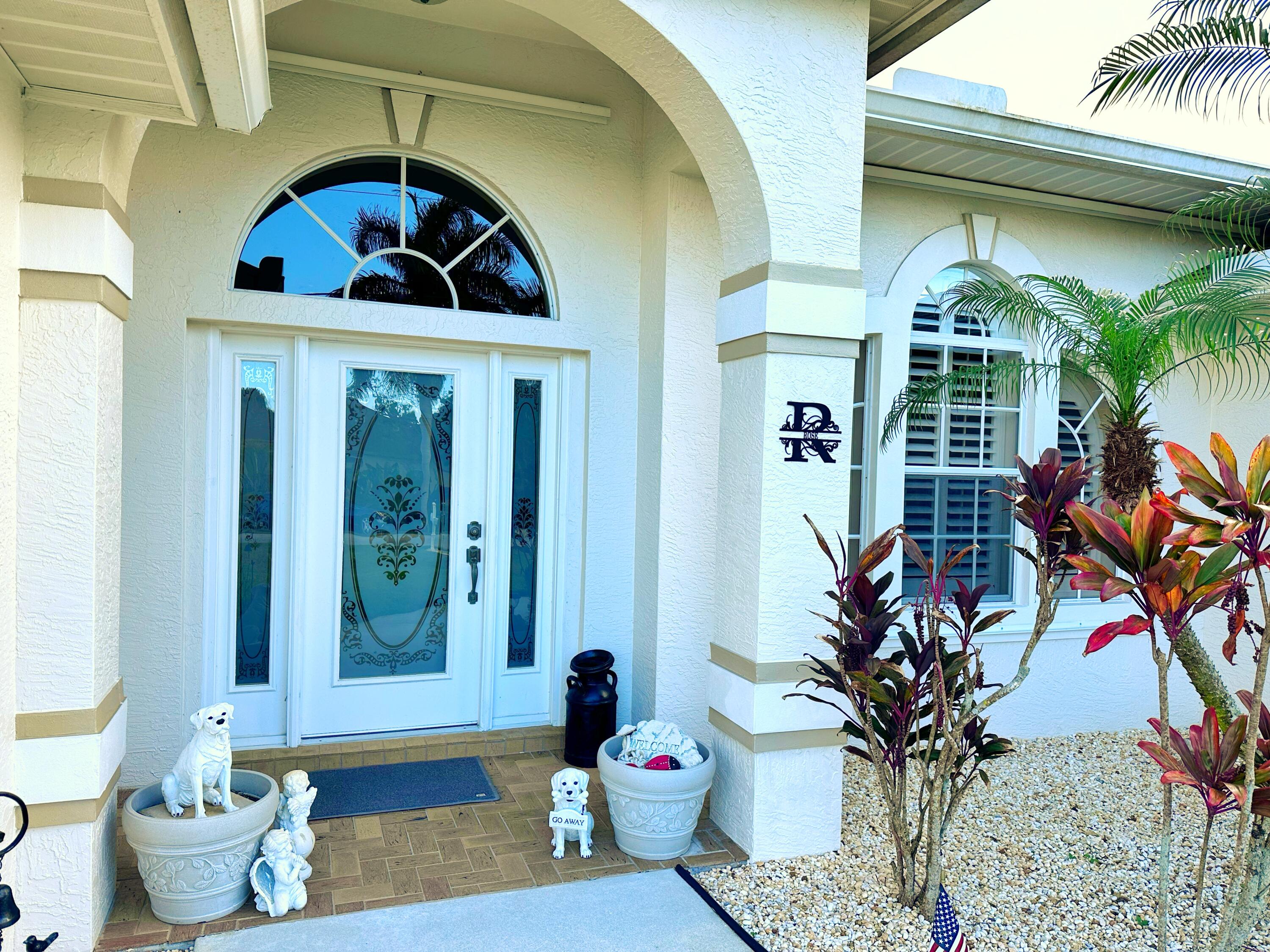 5996 Northwest Wolverine Road Port St. Lucie, FL 34986 - Photo 2 of 27 Front Entrance