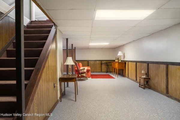 a view of a swimming pool with a yard