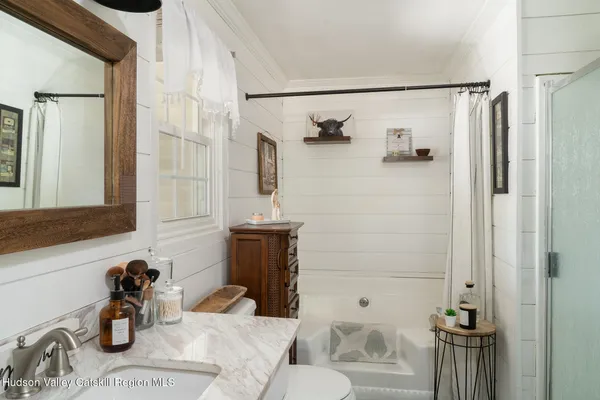 a kitchen with a sink stove and microwave