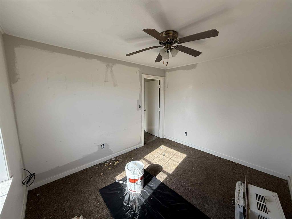 110 Hickory Street Roscoe, TX 79545 - Photo 9 of 9 a view of room with a ceiling fan