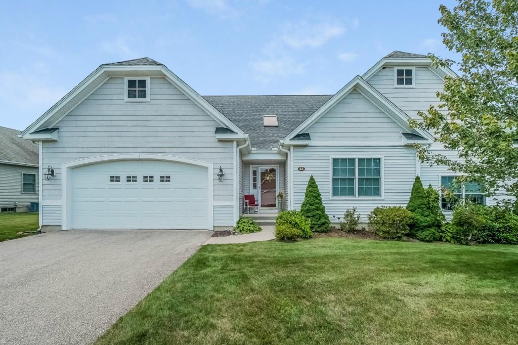 22 Buttonwood Road, Unit 22 Hebron, CT 06248 - Photo 1 of 1 a front view of a house with garden