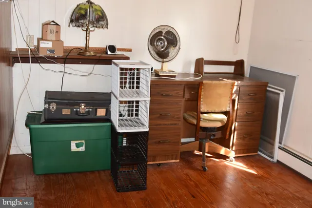 a view of dining room with wooden floor