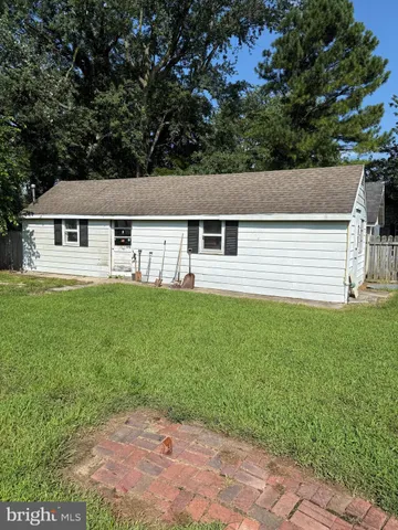 a house view with a garden space