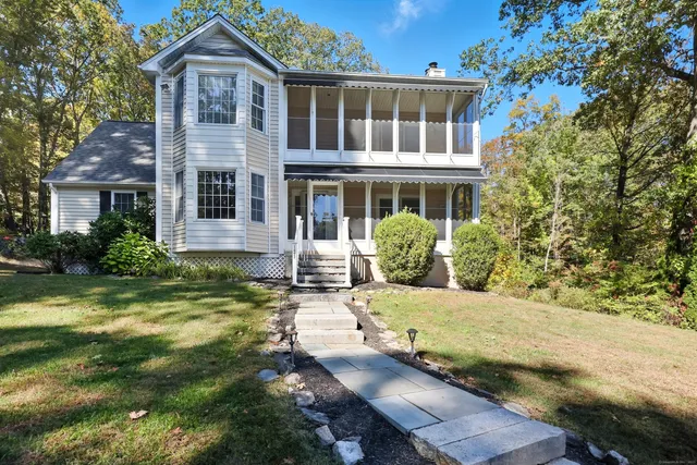 front view of house with a yard