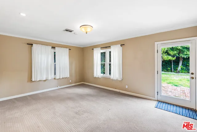 a bathroom with a sink a shower and a mirror