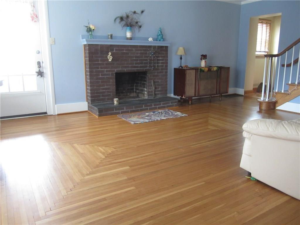1257 Rostraver Road Belle Vernon, PA 15012 - Photo 9 of 23 Pristine Oak Floors in This Family Room