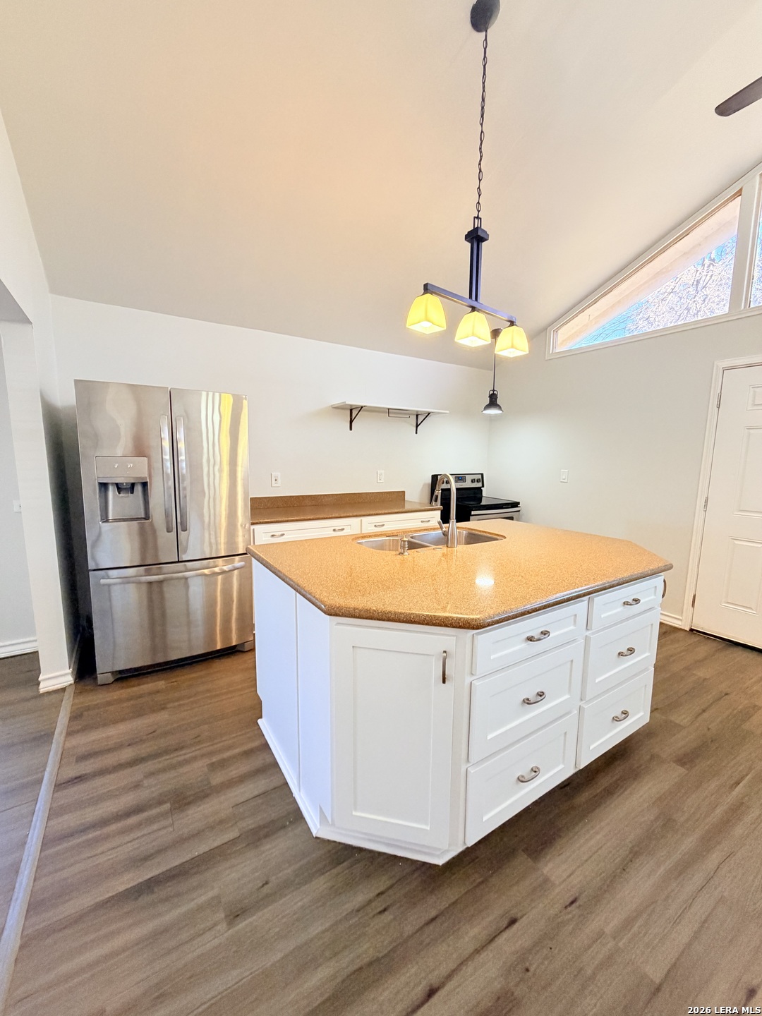 255 Cumberland Road San Antonio, TX 78204 - Photo 7 of 18 a kitchen with sink cabinets and stainless steel appliances