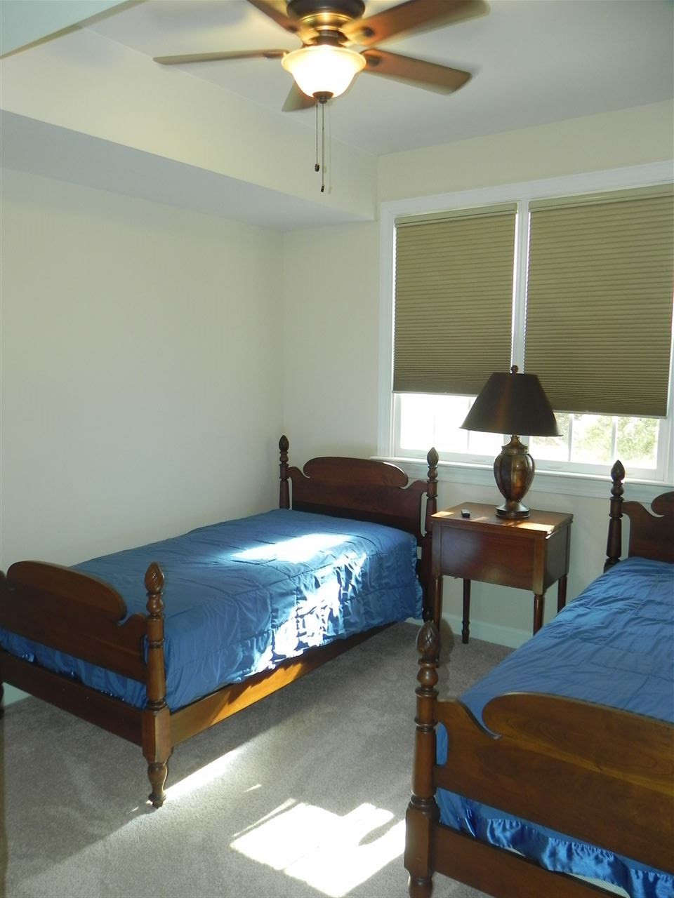 5505 Overleaf Court Raleigh, NC 27615 - Photo 21 of 25 Located in the Basement and Disguised as a Bedroom, This is a Fantastic Space to Have a Home Office Away from the Noises of the Household - Has a Large Walk-In Closet Filled w/Shelving to Hold Your Work Stuff. Office