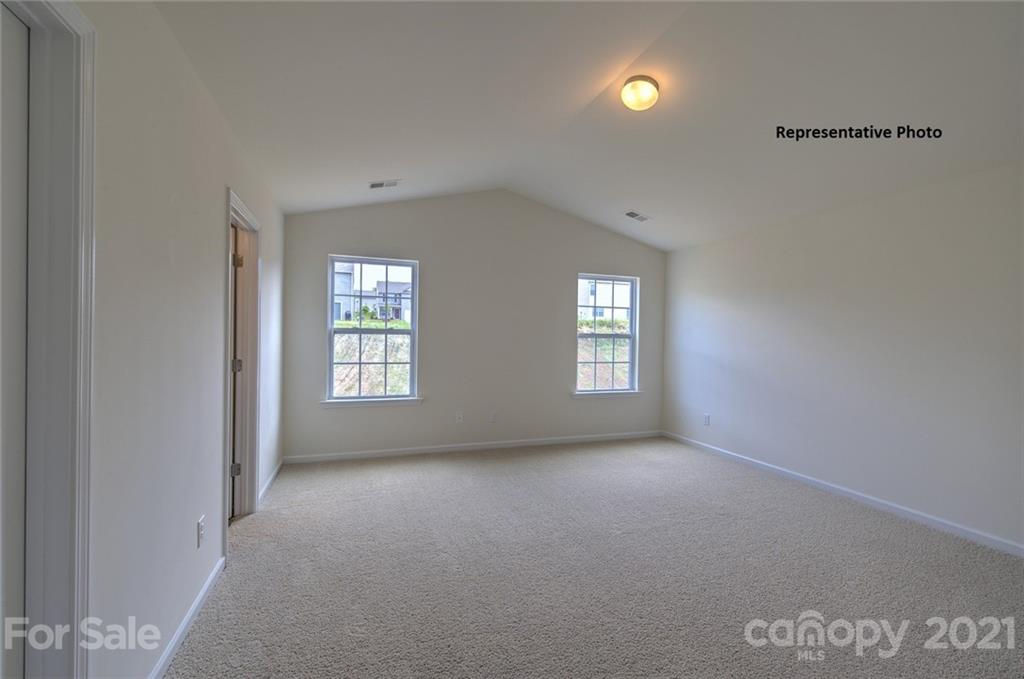 7112 Finnigan Road Charlotte, NC 28215 - Photo 24 of 33 a view of an empty room with a window