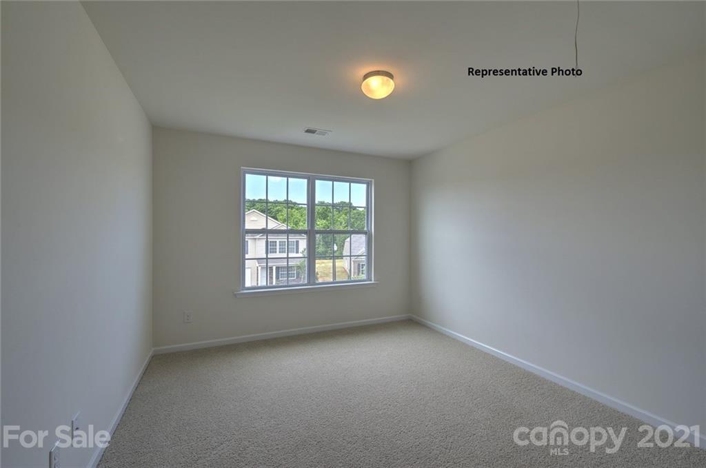7112 Finnigan Road Charlotte, NC 28215 - Photo 29 of 33 an empty room with a window