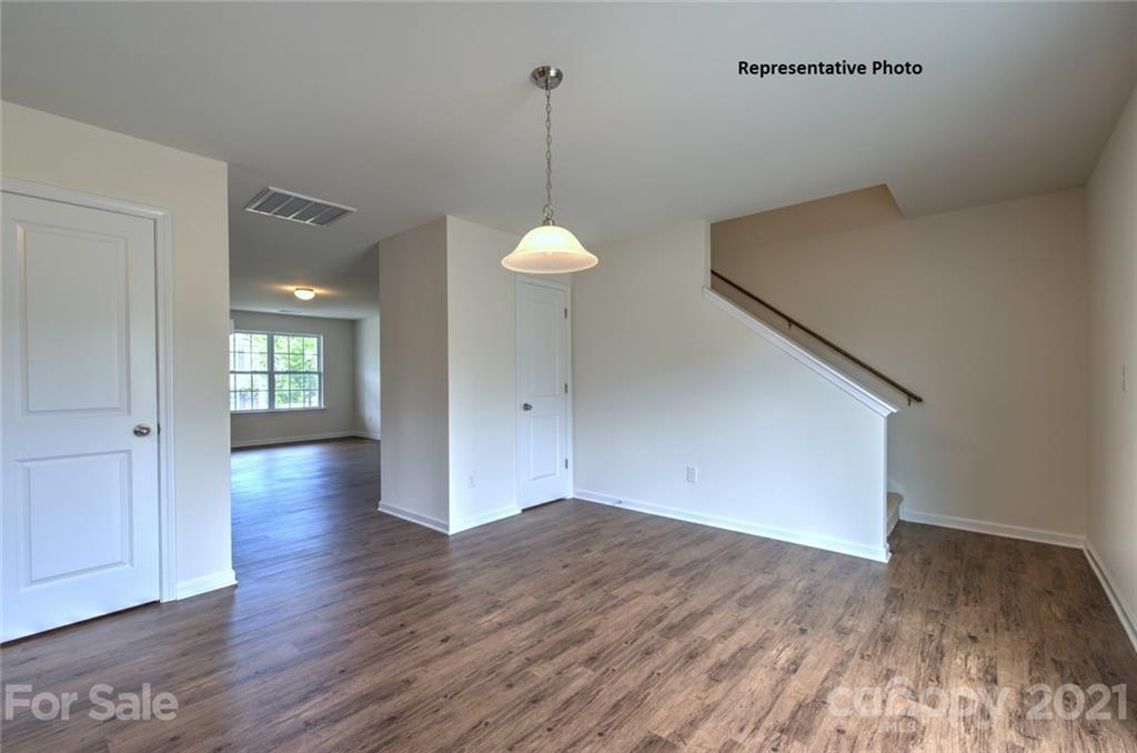 7112 Finnigan Road Charlotte, NC 28215 - Photo 8 of 33 a view of a room with wooden floor and window