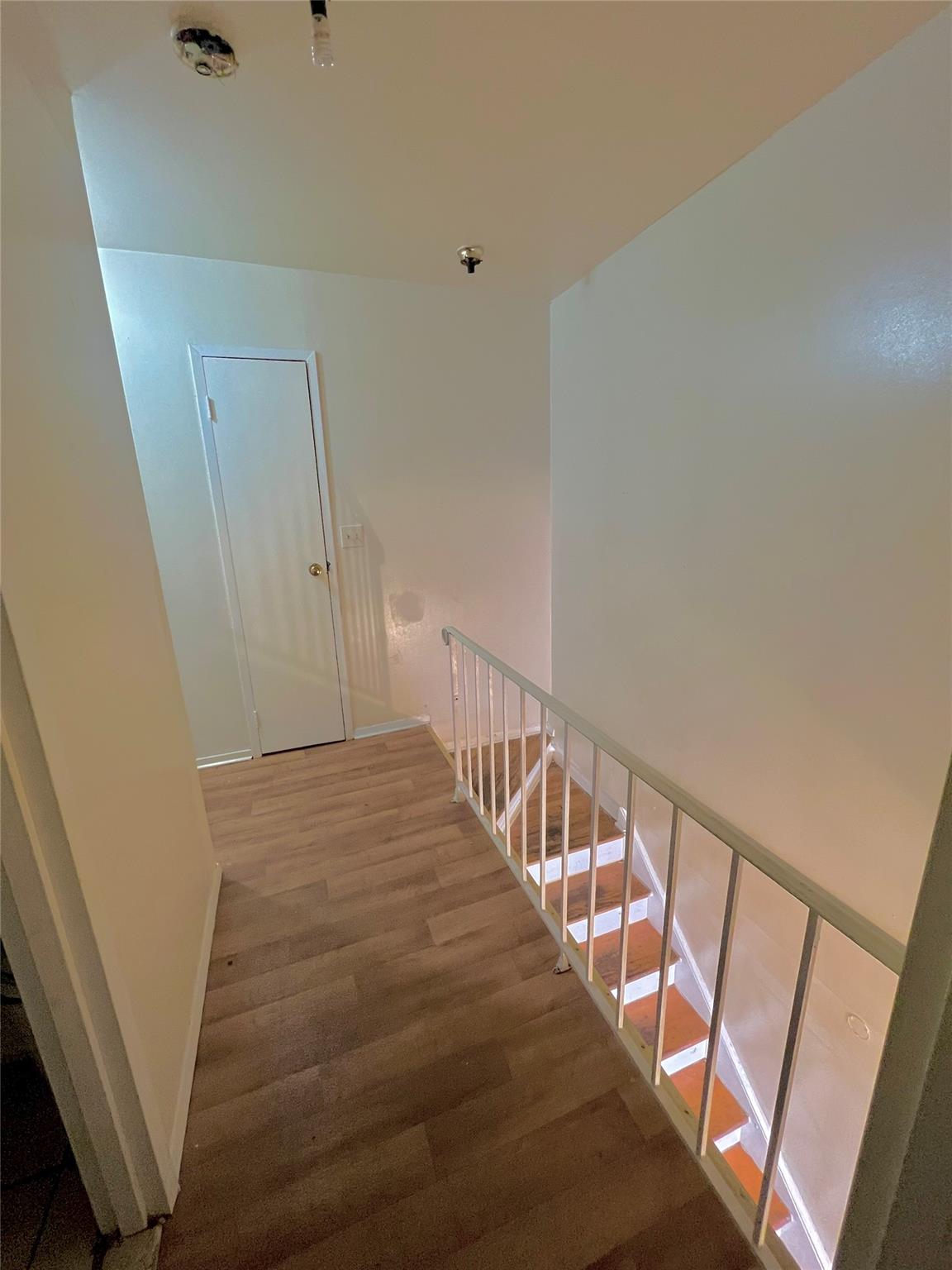 620 East 182nd Street Bronx, NY 10457 - Photo 5 of 9 a view of a hallway with staircase