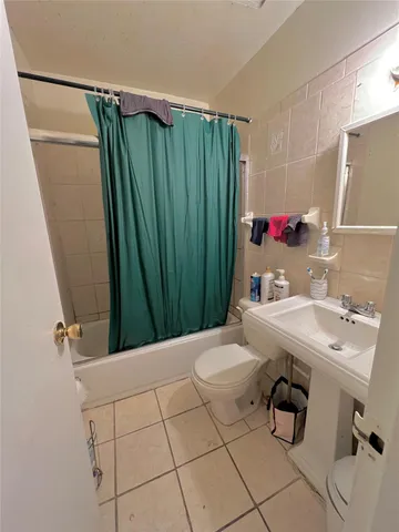 a room with furniture and wooden floor