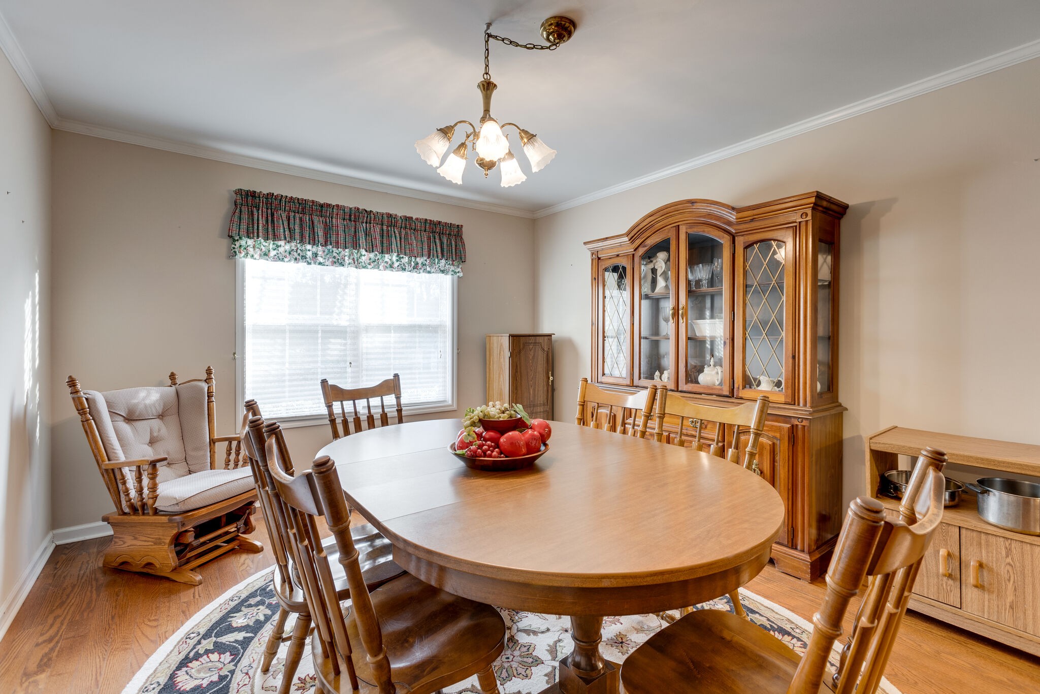 10 Harding Road Leoma, TN 38468 - Photo 13 of 26 a dining room with furniture a chandelier and wooden floor
