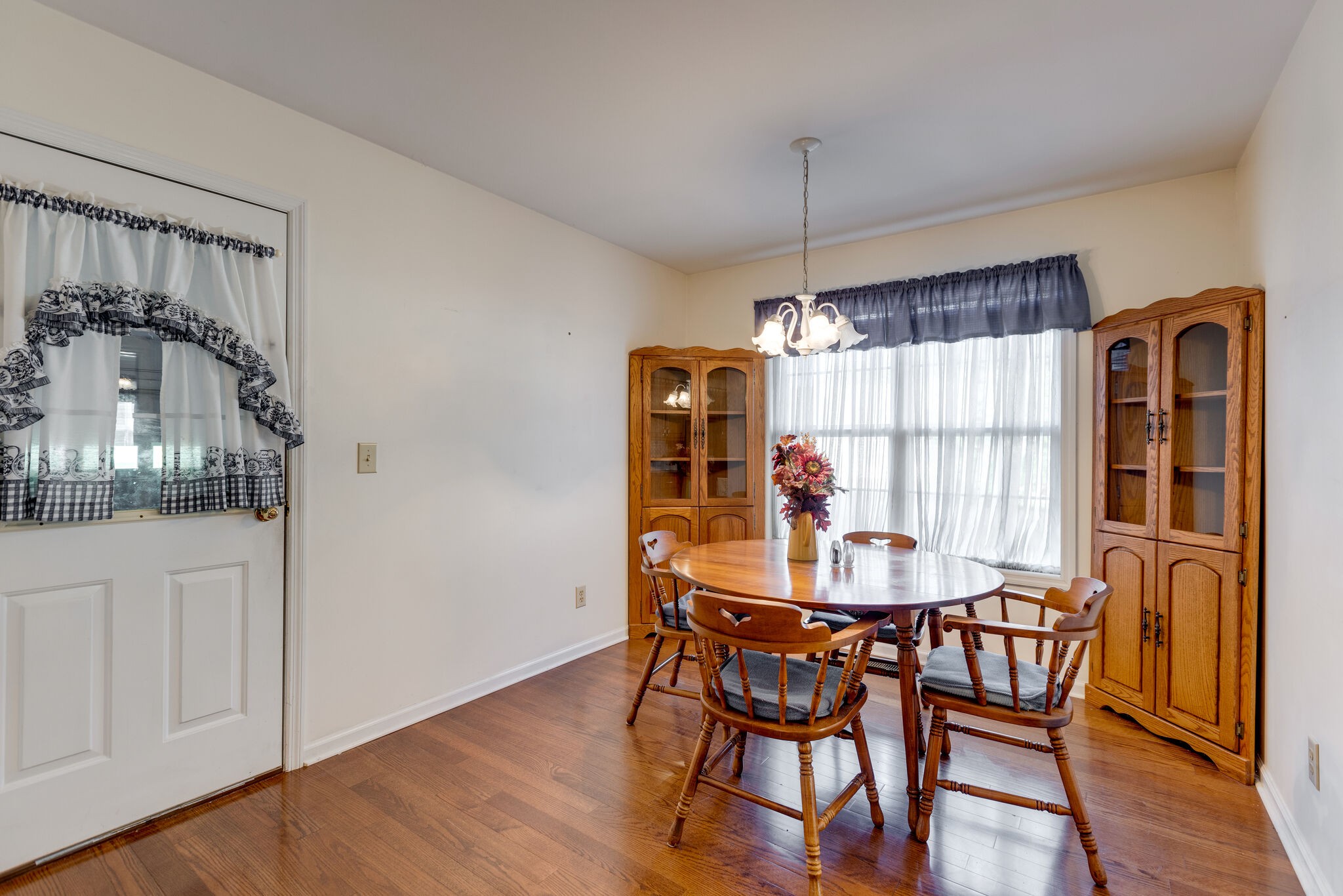 10 Harding Road Leoma, TN 38468 - Photo 14 of 26 a dining room with furniture window and wooden floor