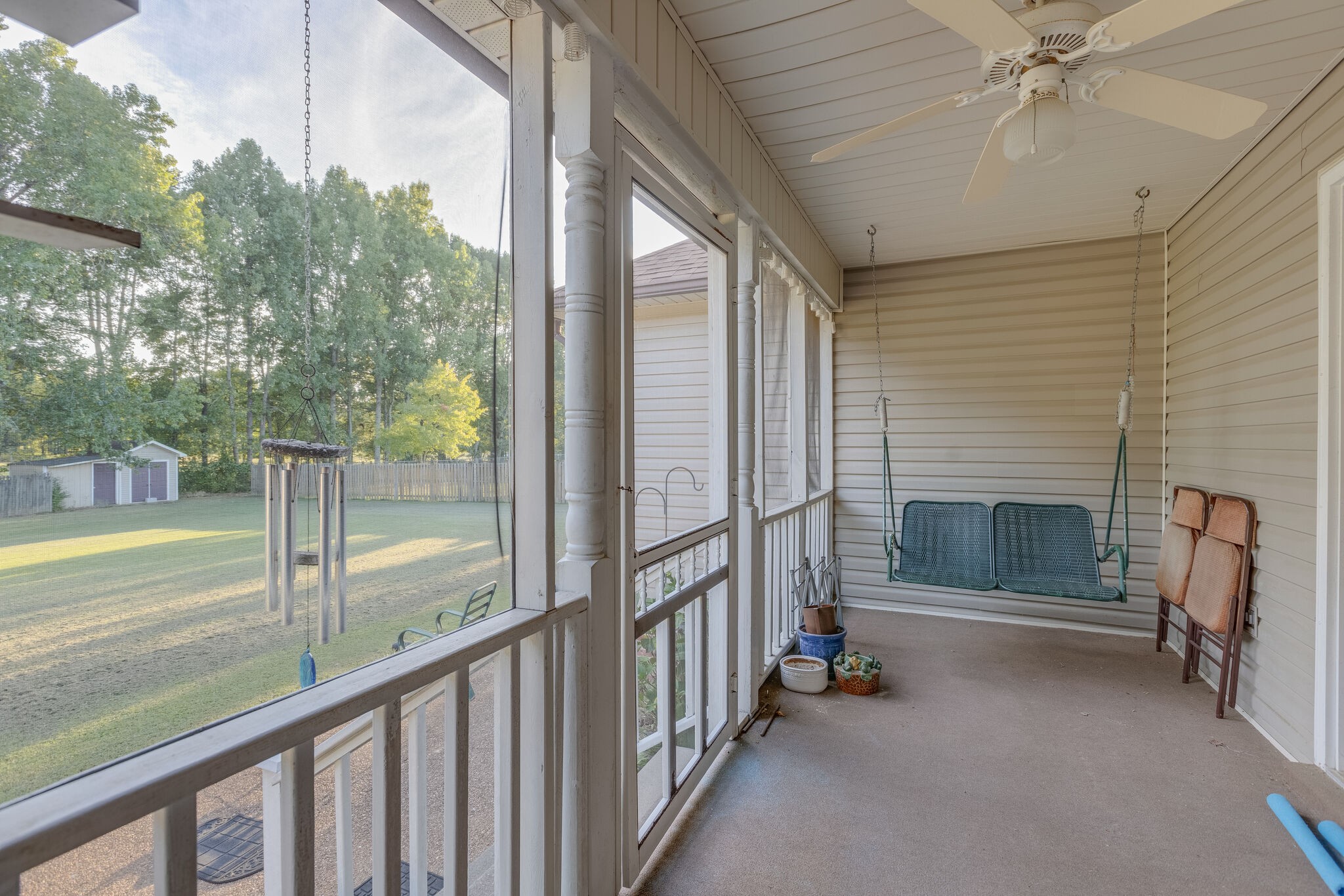 10 Harding Road Leoma, TN 38468 - Photo 19 of 26 a view of a porch with wooden floor and roof with a fireplace