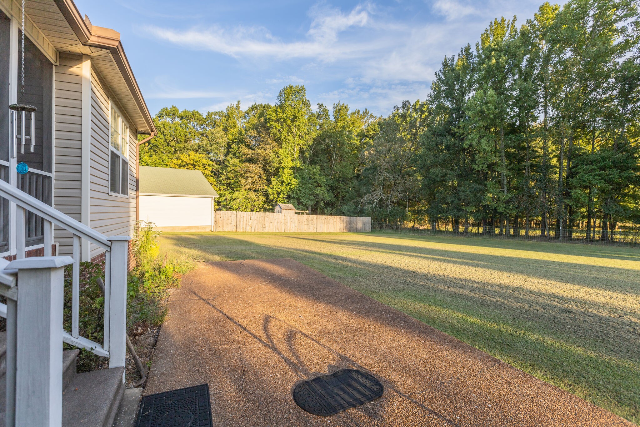 10 Harding Road Leoma, TN 38468 - Photo 20 of 26 a view of a house with a backyard and a tree