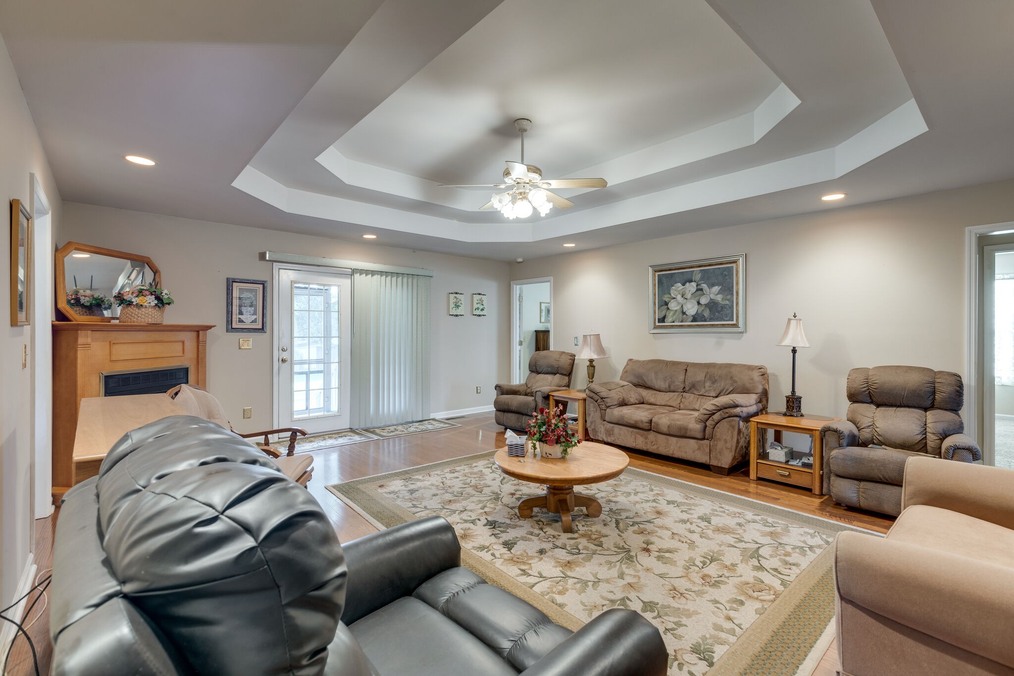 10 Harding Road Leoma, TN 38468 - Photo 7 of 26 a living room with furniture and a chandelier