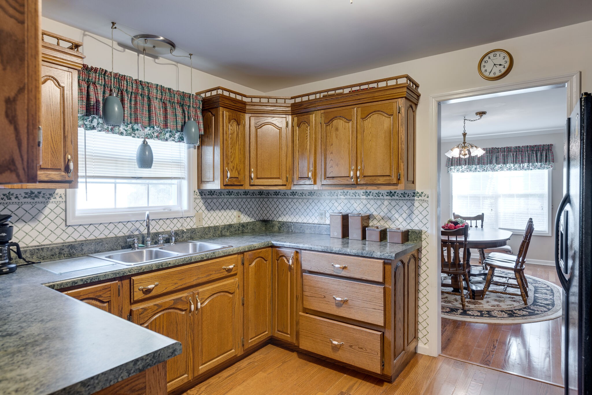 10 Harding Road Leoma, TN 38468 - Photo 8 of 26 a kitchen with stainless steel appliances granite countertop a sink a stove and cabinets