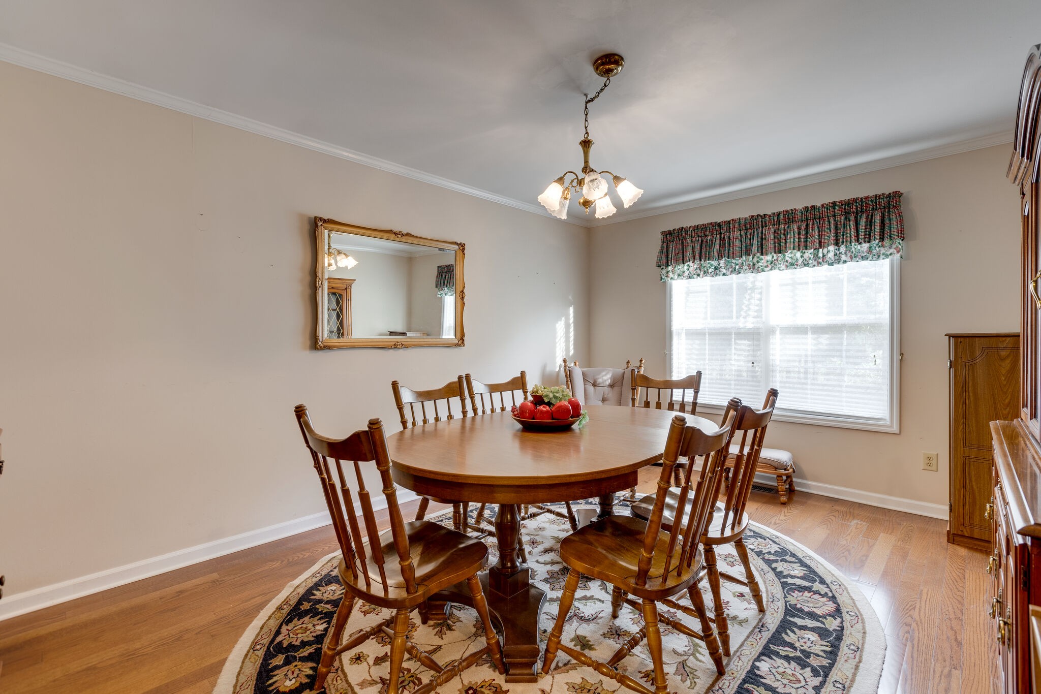 10 Harding Road Leoma, TN 38468 - Photo 10 of 26 a dining room with furniture a chandelier and wooden floor