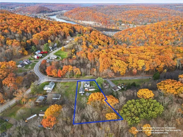 an aerial view of lake and mountain view