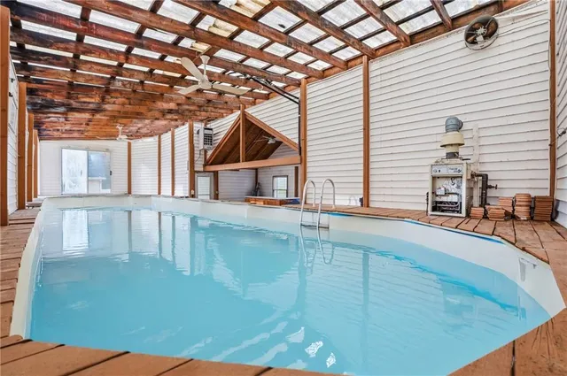 a view of a house with a backyard