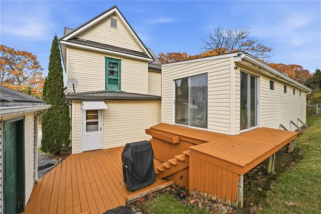 a backyard of a house with seating space