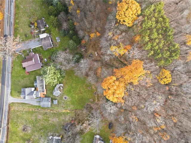 a bathroom with a sink mirror and vanity