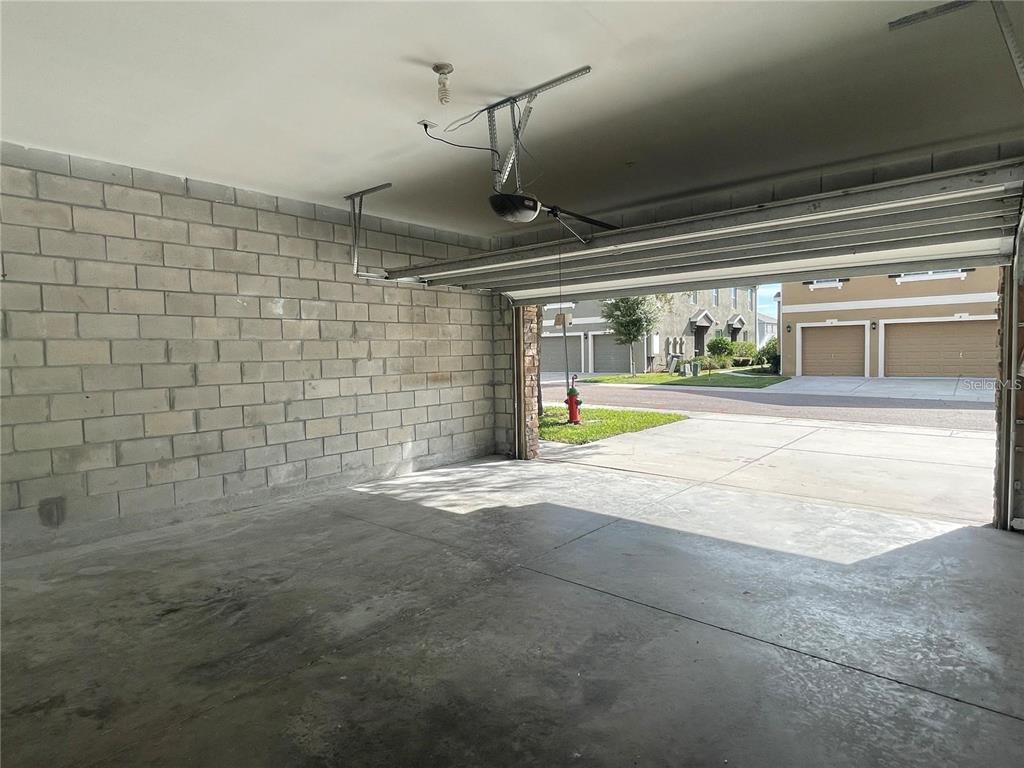 3739 Seneca Club Loop, Unit A Orlando, FL 32808 - Photo 2 of 31 a view of a indoor basketball court
