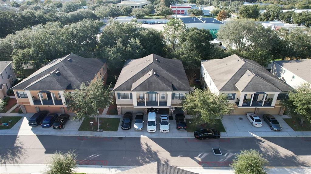 3739 Seneca Club Loop, Unit A Orlando, FL 32808 - Photo 22 of 31 an aerial view of a house