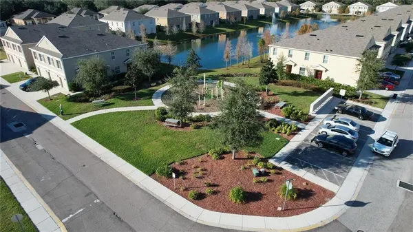a view of swimming pool from a lake view