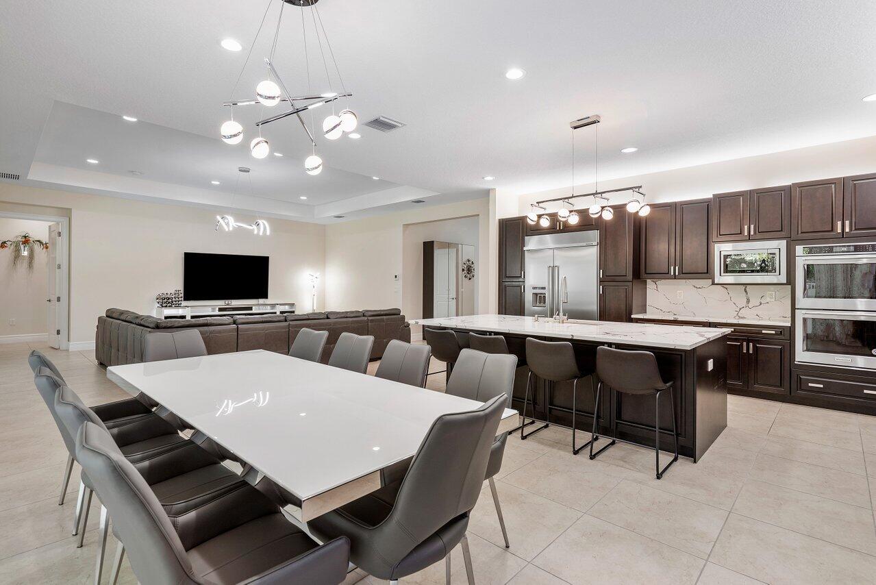 11800 Windy Frst Way Boca Raton, FL 33498 - Photo 13 of 56 Kitchen and Dining