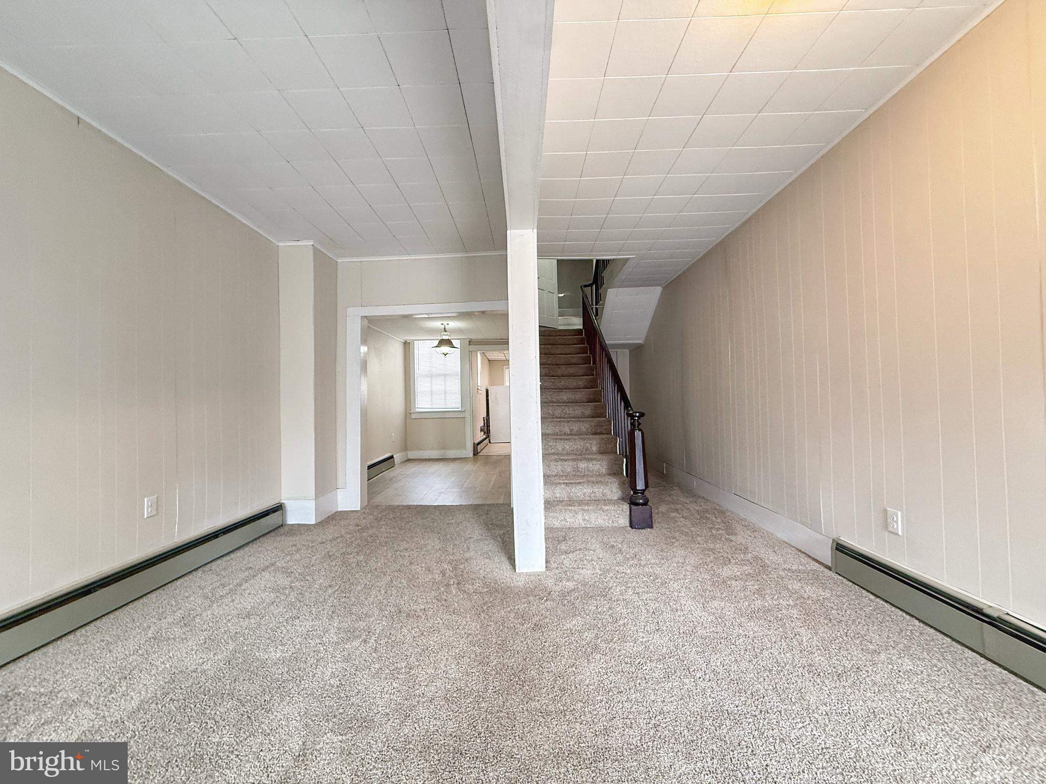 230 Walnut Street Sunbury, PA 17801 - Photo 18 of 33 a view of an empty room with stairs