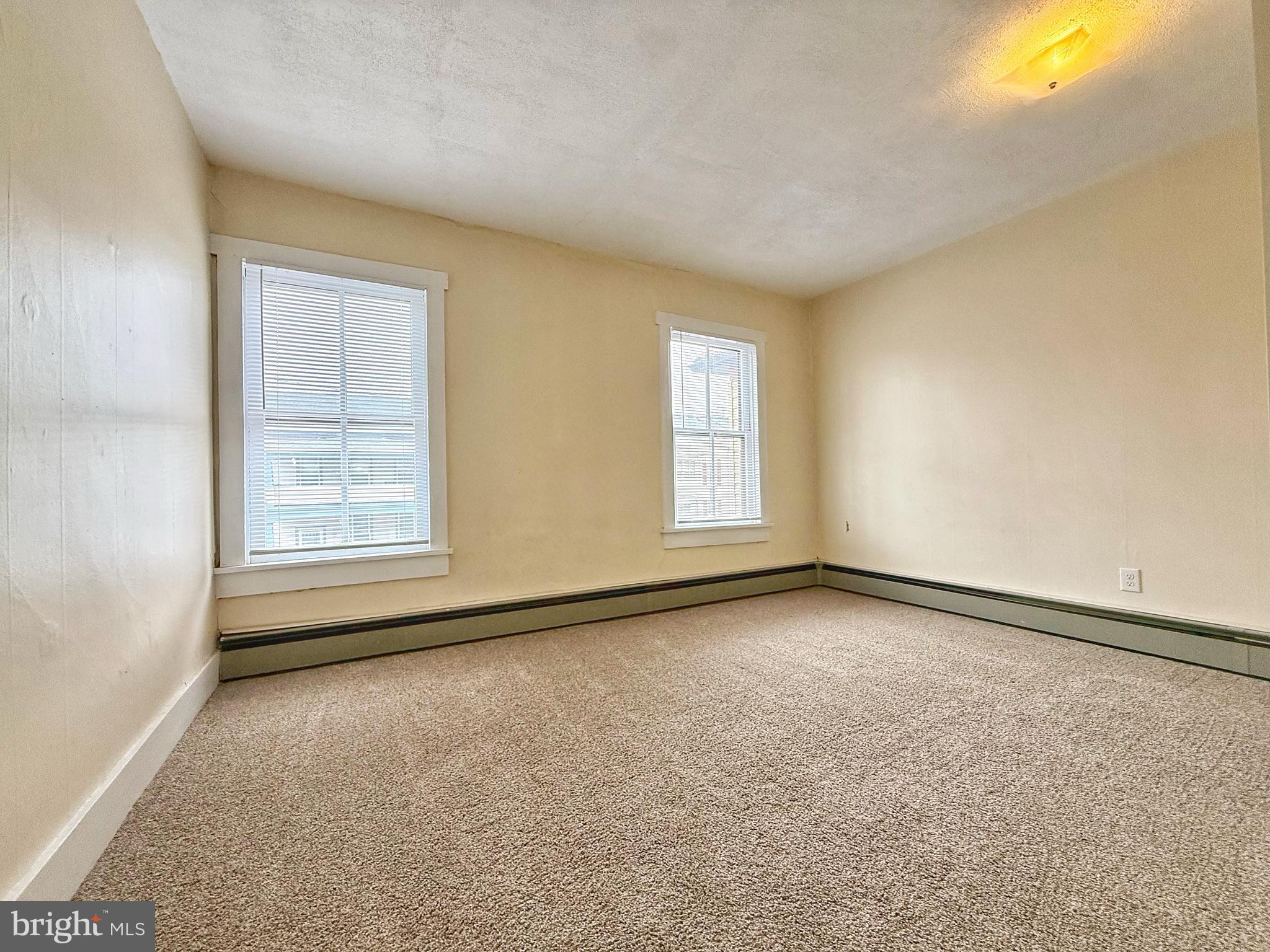 230 Walnut Street Sunbury, PA 17801 - Photo 21 of 33 an empty room with windows