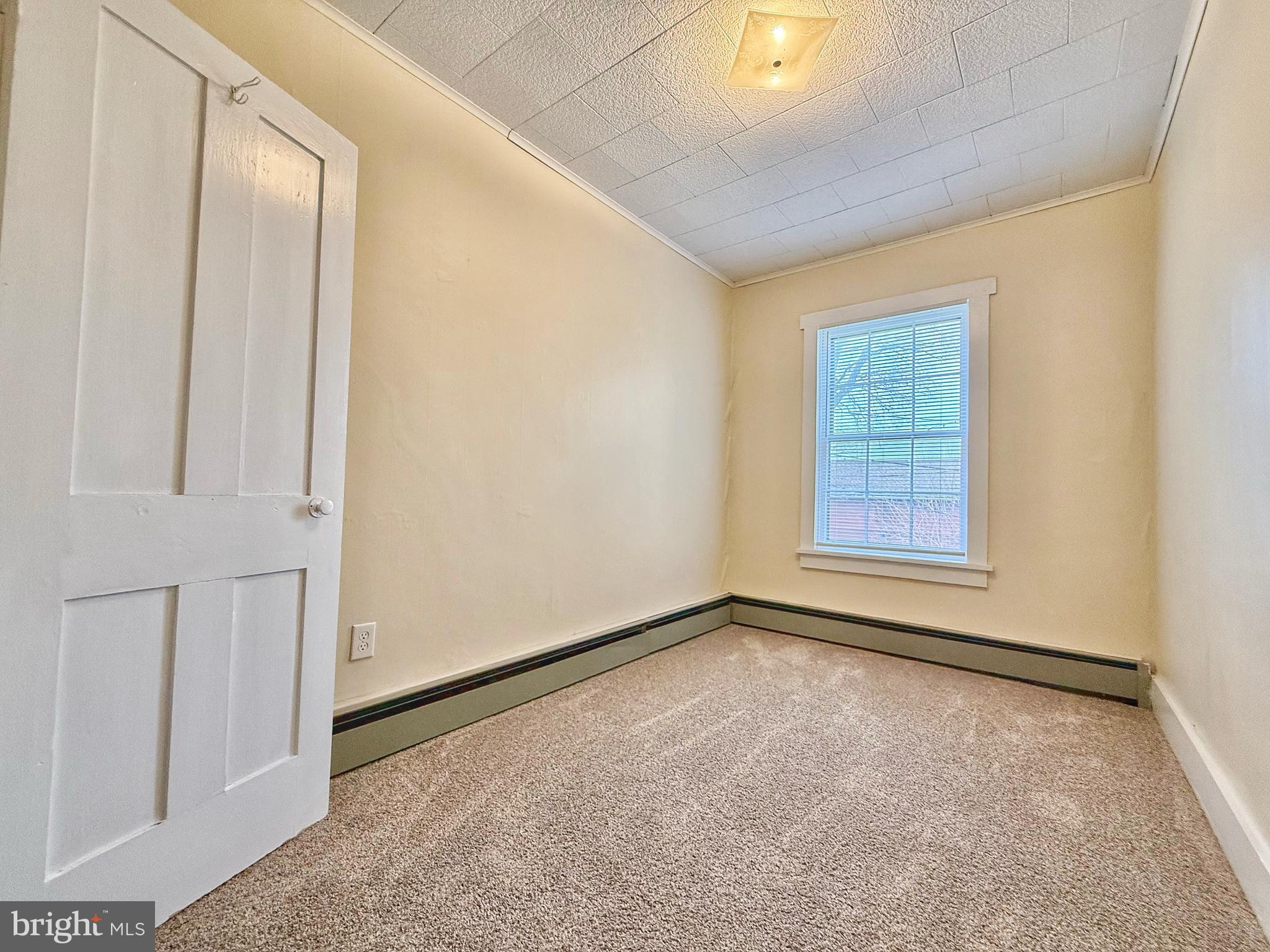 230 Walnut Street Sunbury, PA 17801 - Photo 23 of 33 an empty room with windows