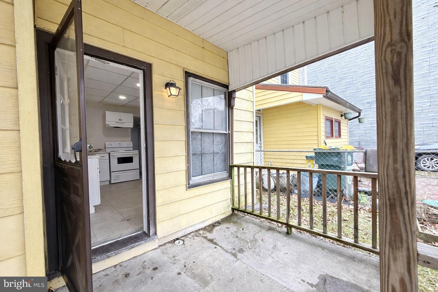 230 Walnut Street Sunbury, PA 17801 - Photo 5 of 33 a view of a porch with a floor to ceiling window