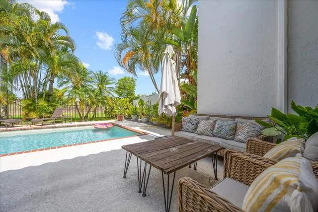 a view of swimming pool with a garden