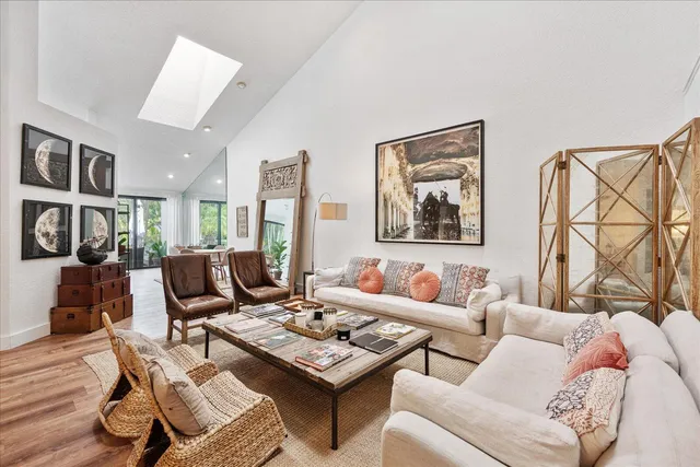 a living room with furniture and a couch