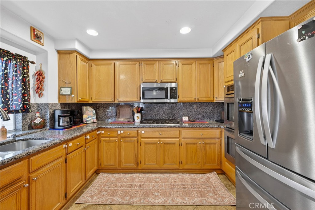 807 Lomond Drive Riverside, CA 92508 - Photo 21 of 47 Updates built in a gas stovetop and moved oven to the right...