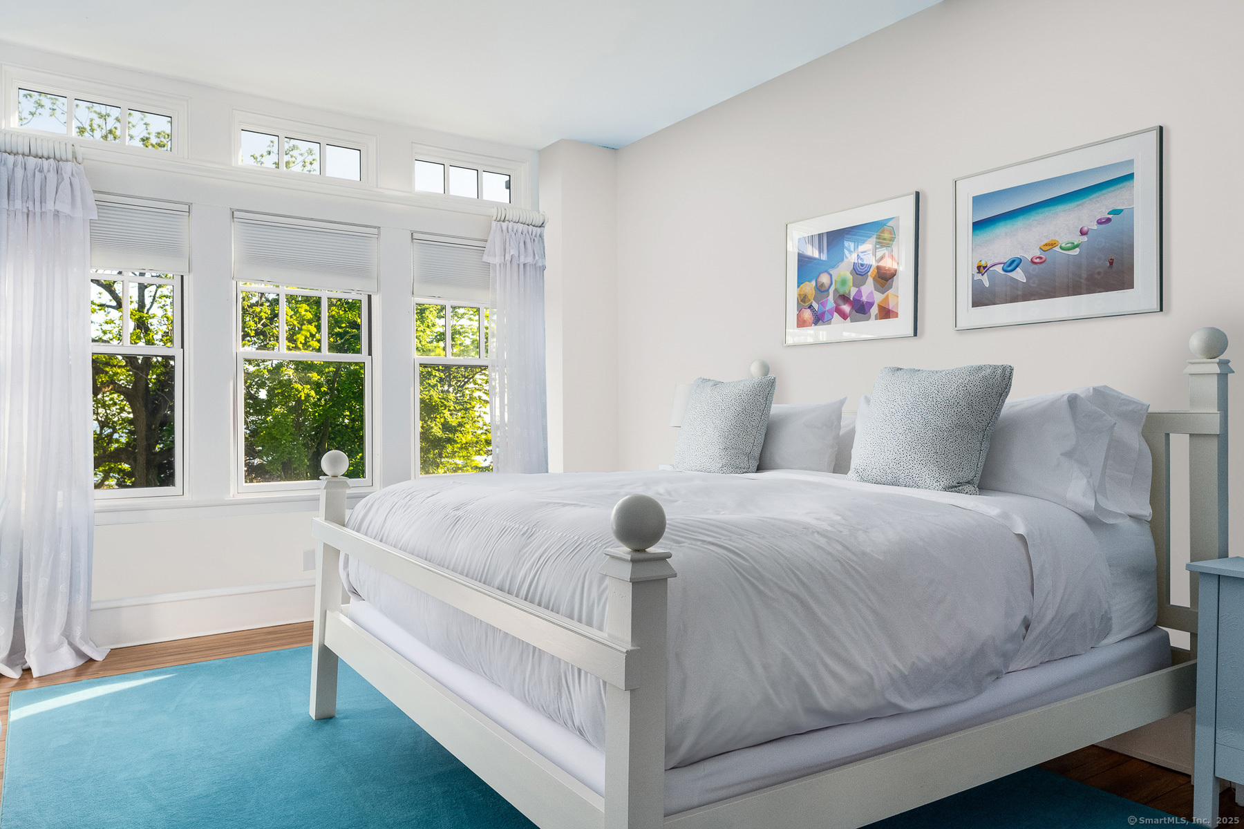 Rogers Island Branford, CT 06405 - Photo 15 of 40 a bed sitting in a bedroom next to a window