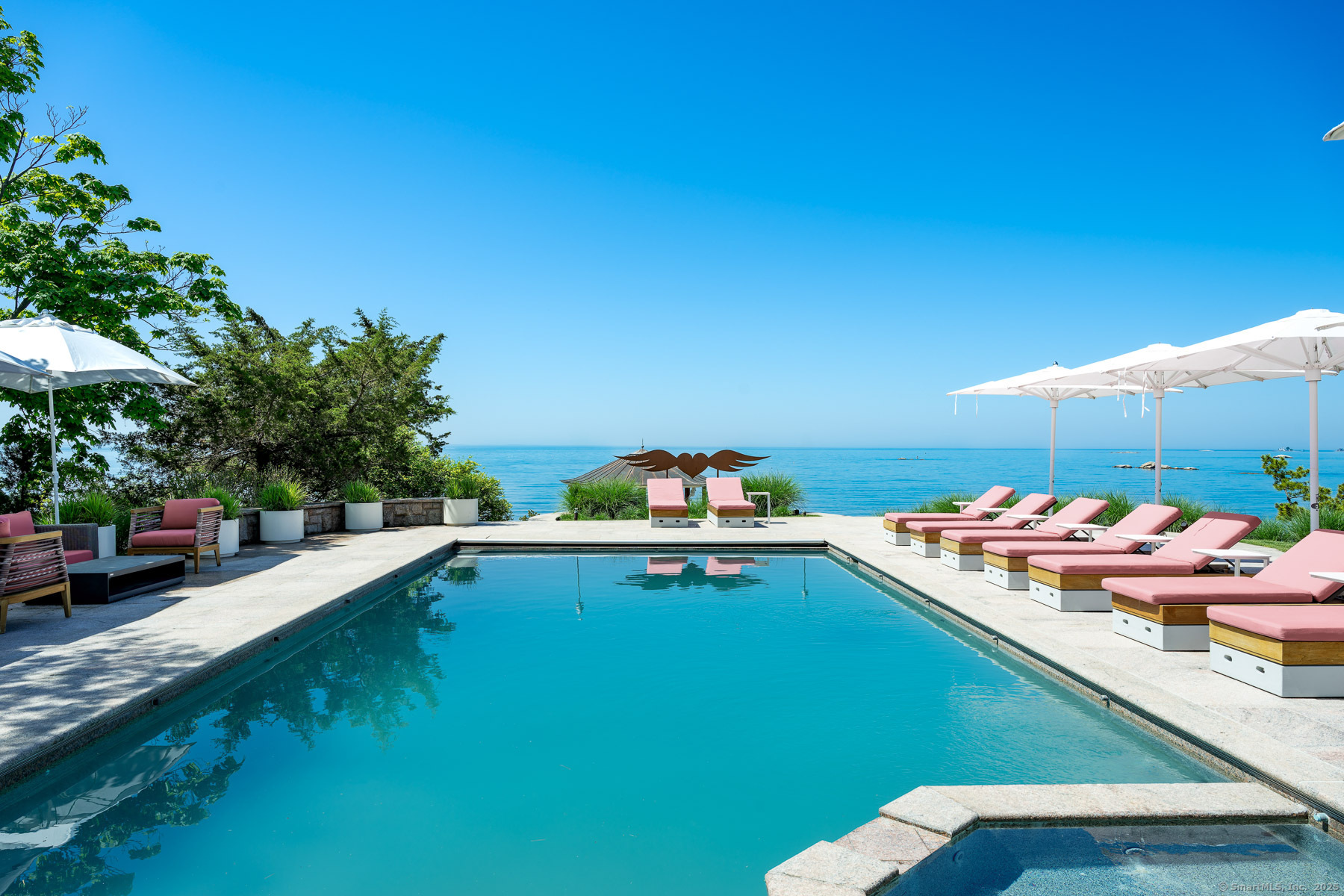 Rogers Island Branford, CT 06405 - Photo 21 of 40 a small pool with a table and chairs