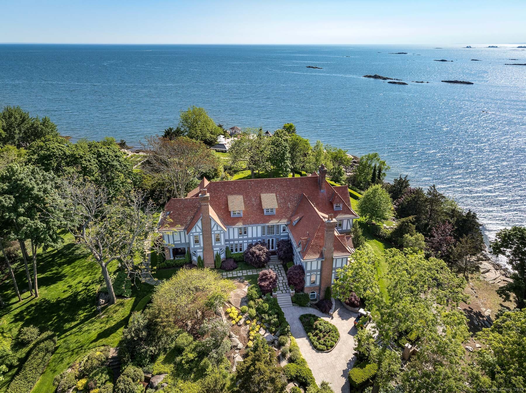 Rogers Island Branford, CT 06405 - Photo 3 of 40 a aerial view of a house with a garden