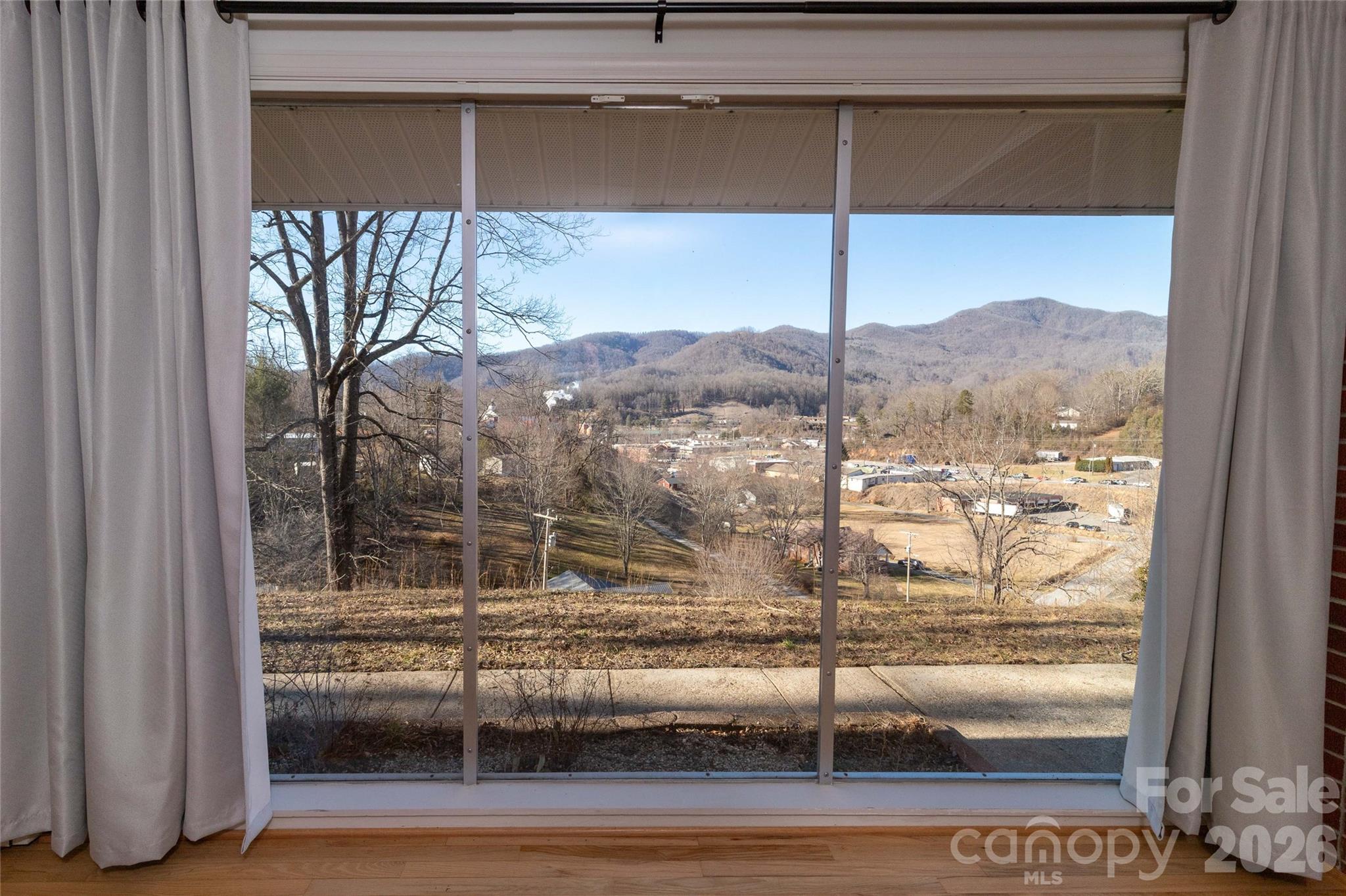 223 Cherry Street Sylva, NC 28779 - Photo 14 of 29 a view of a house with a door and a window