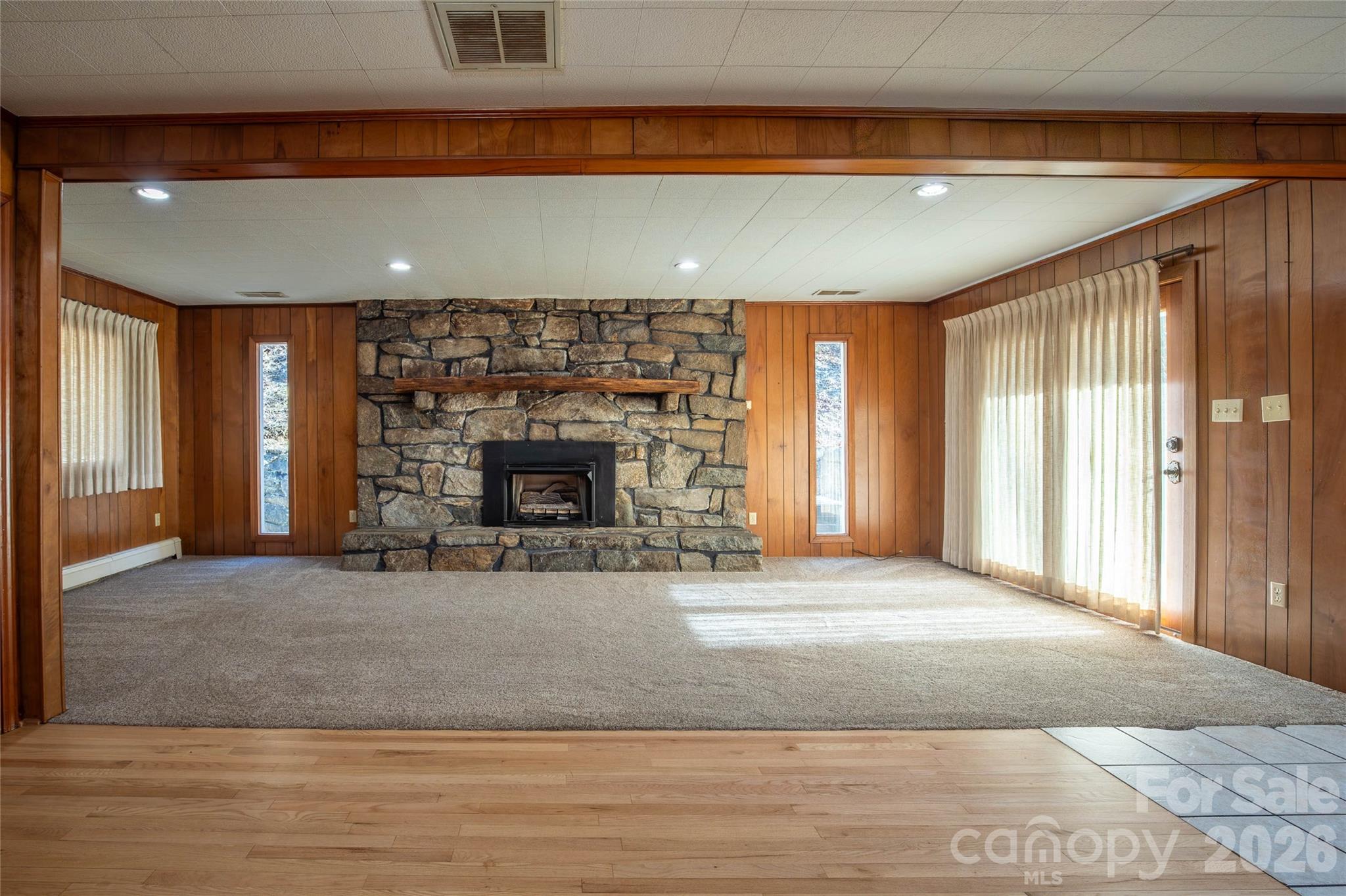223 Cherry Street Sylva, NC 28779 - Photo 23 of 29 a open kitchen view with fireplace and window